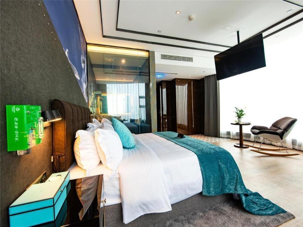 Xana Hotelle-Hotel Luzhou Baizitu Square Bagian luar foto