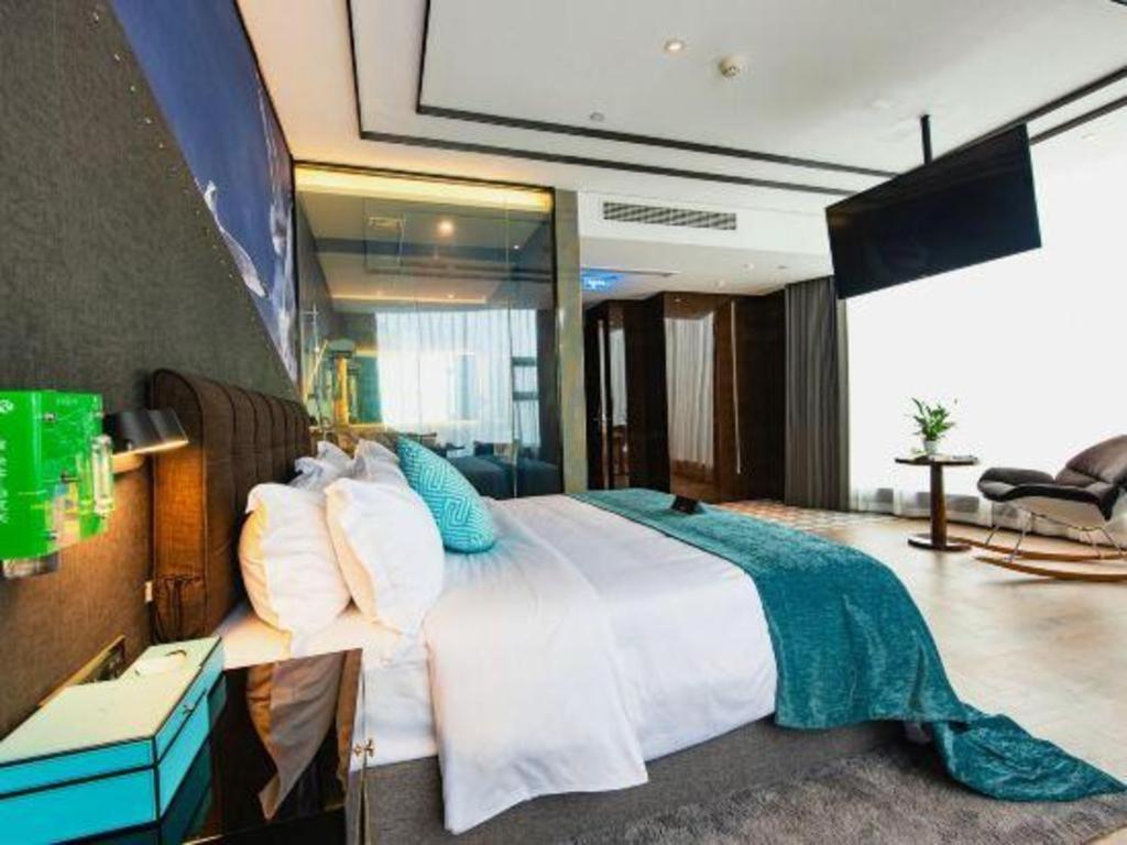 Xana Hotelle-Hotel Luzhou Baizitu Square Bagian luar foto