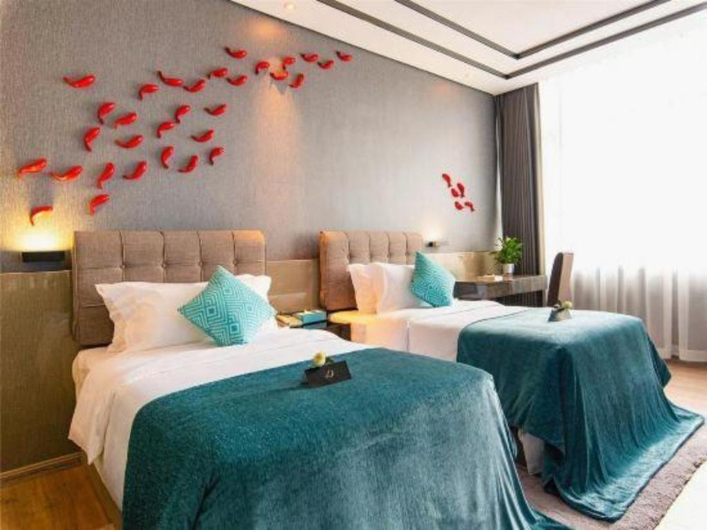 Xana Hotelle-Hotel Luzhou Baizitu Square Bagian luar foto