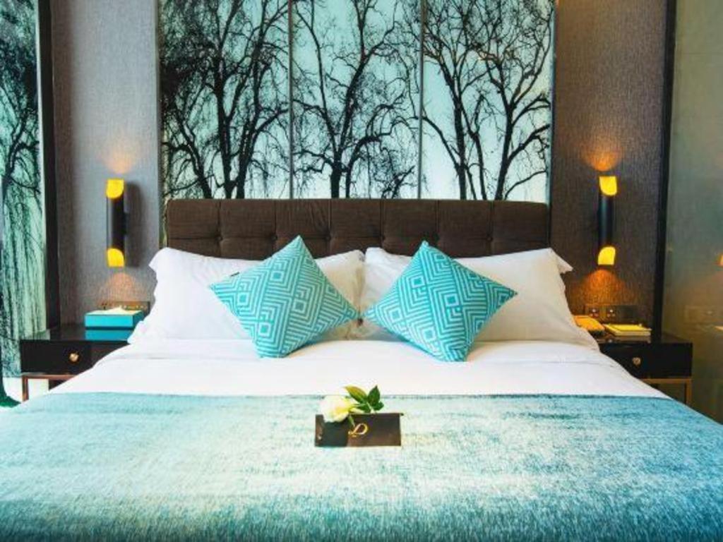 Xana Hotelle-Hotel Luzhou Baizitu Square Bagian luar foto