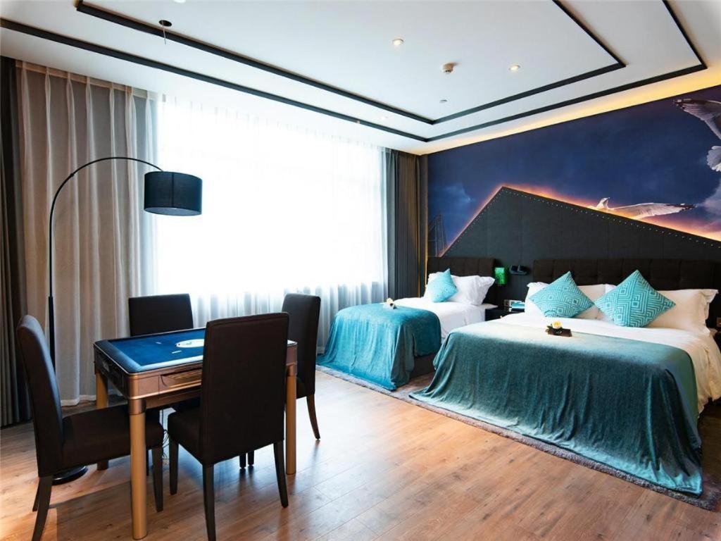 Xana Hotelle-Hotel Luzhou Baizitu Square Bagian luar foto