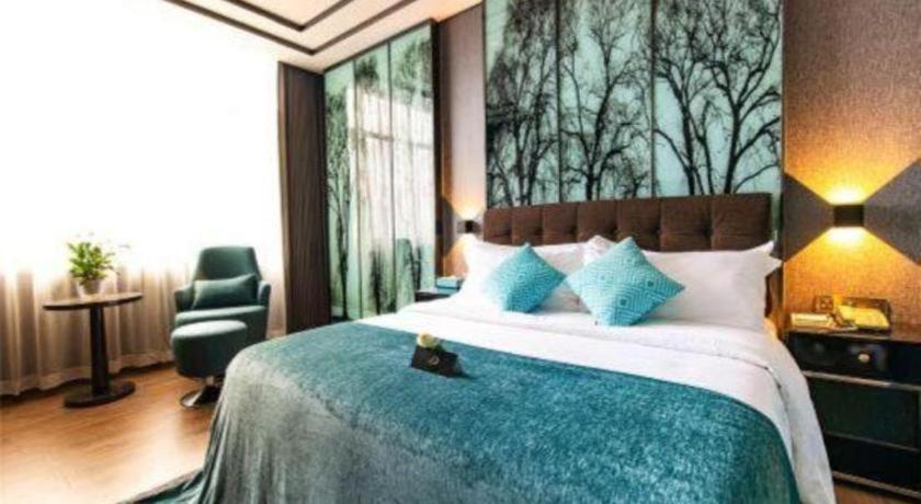 Xana Hotelle-Hotel Luzhou Baizitu Square Bagian luar foto