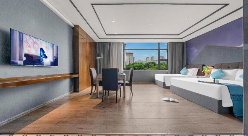Xana Hotelle-Hotel Luzhou Baizitu Square Bagian luar foto