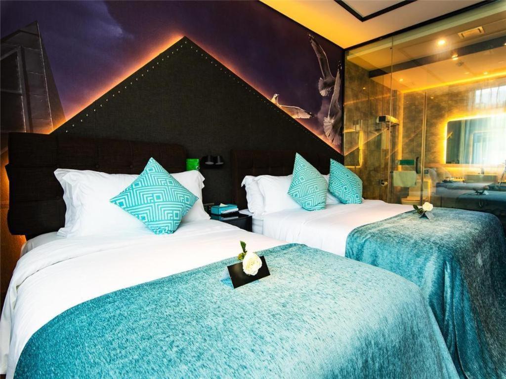 Xana Hotelle-Hotel Luzhou Baizitu Square Bagian luar foto