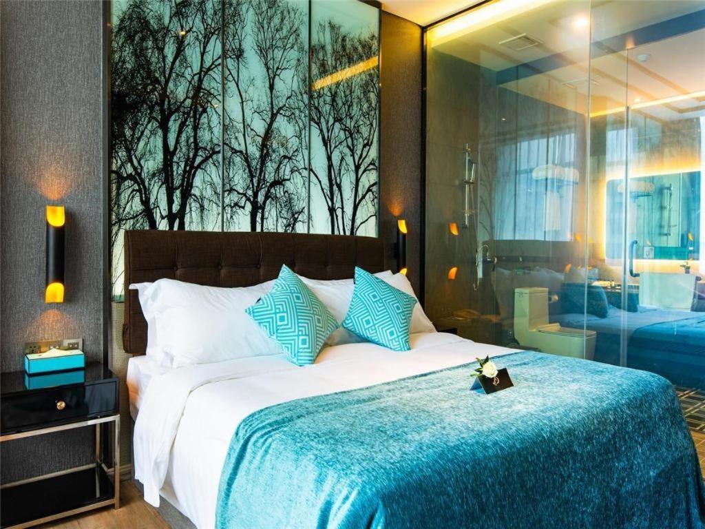 Xana Hotelle-Hotel Luzhou Baizitu Square Bagian luar foto
