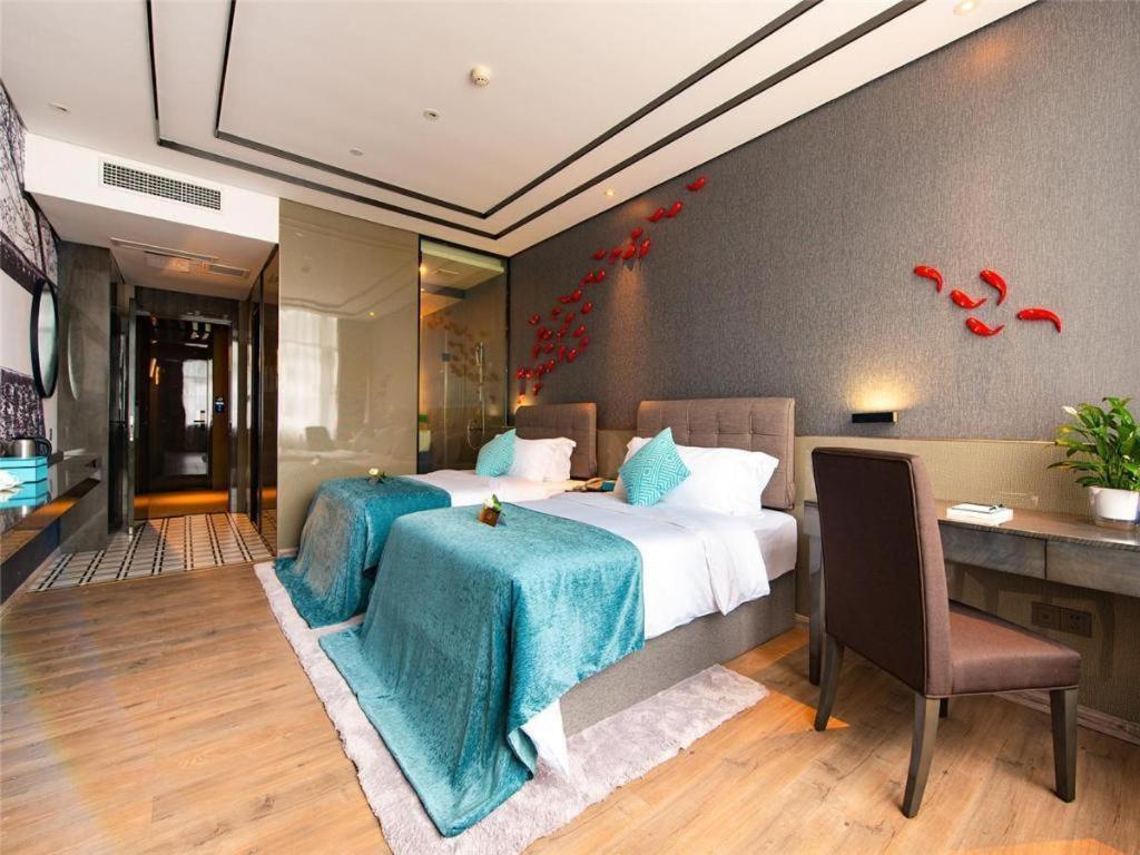 Xana Hotelle-Hotel Luzhou Baizitu Square Bagian luar foto