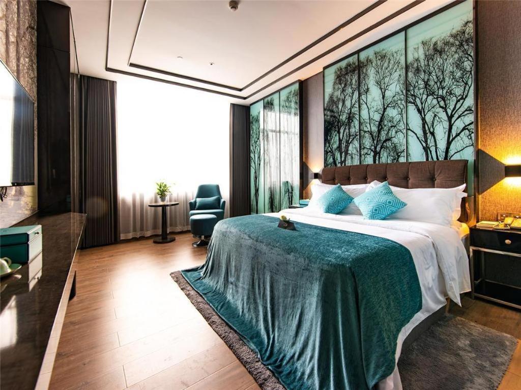Xana Hotelle-Hotel Luzhou Baizitu Square Bagian luar foto